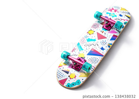 Bright skateboard with a pattern on a light background. Space for text. Bright skateboard with a pattern on a light background. Space for text. 138438032