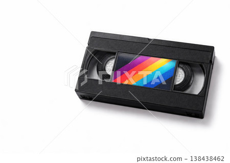 A video cassette with a colored sticker on a light background. Space for text. A video cassette with a colored sticker on a light background. Space for text. 138438462