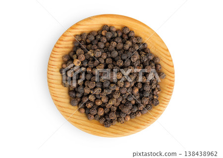 Black peppercorns or pepper in a wooden bowl isolated on a white background. Top view. Flat lay 138438962