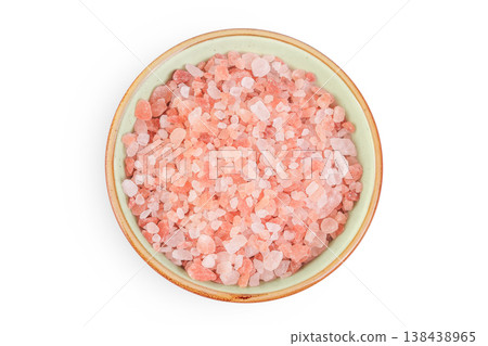 Pink Himalayan salt in ceramic bowl isolated on white background. Top view. 138438965