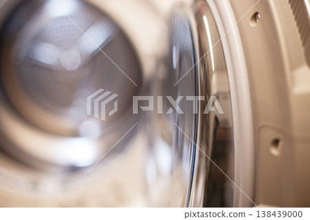 Clean metallic drum inside dryer for laundry tasks Clean metallic drum inside dryer for laundry tasks 138439000