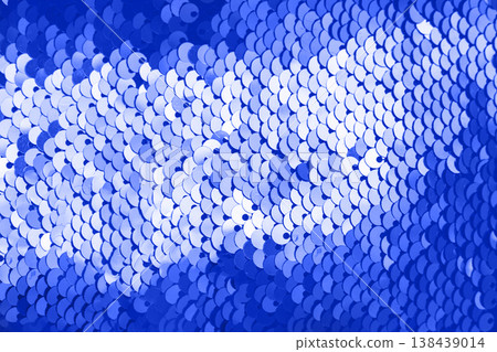 Blue abstract sequins sparkling background. Texture of sequins. Blue abstract sequins sparkling background. Texture of sequins. 138439014