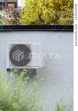 air conditioning on facade of building, air cooling in hot weather. air conditioning on facade of building, air cooling in hot weather. 138439446