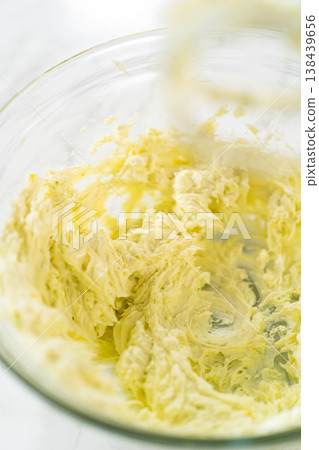 Close-up of a creamy and smooth cream cheese mixture combined with wasabi, perfectly whipped for the smoked salmon rolls. Close-up of a creamy and smooth cream cheese mixture combined with wasabi, perfectly whipped for the smoked salmon rolls. 138439656