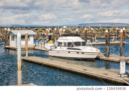 Edmonds, Marina Beach Park, WA, 03.13.2025 - a boat moored at the pier Edmonds, Marina Beach Park, WA, 03.13.2025 - a boat moored at the pier 138439936