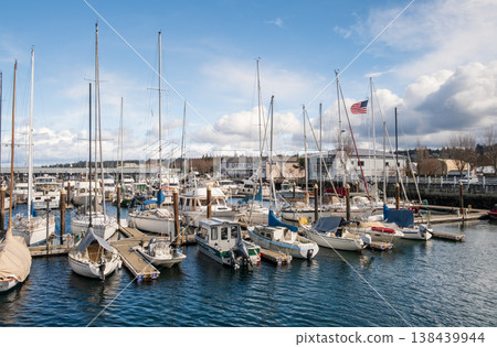Edmonds, Marina Beach Park, WA, 03.13.2025 - boats are moored at the parking lot 138439944