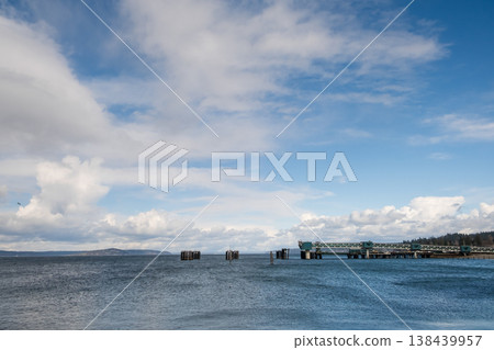 Edmonds, Marina Beach Park, WA, 03.13.2025 - a pier for a ferry carrying cars across the bay Edmonds, Marina Beach Park, WA, 03.13.2025 - a pier for a ferry carrying cars across the bay 138439957