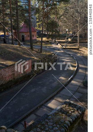 Gentle Curved Path Among Towering Pines. Peaceful Trail Weaving Through Dense Pine Forest Landscape Gentle Curved Path Among Towering Pines. Peaceful Trail Weaving Through Dense Pine Forest Landscape 138440848