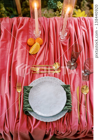 Luxury Pink Velvet Table Setting With Gold Cutlery 138440920