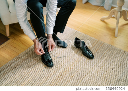 Executive Preparing Person Tying Dress Shoe Executive Preparing Person Tying Dress Shoe 138440924
