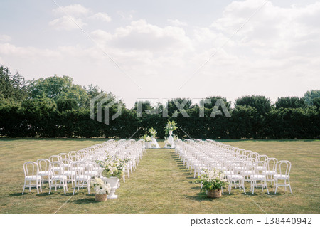 Wide Ceremony Aisle With Rows Of Chairs Wide Ceremony Aisle With Rows Of Chairs 138440942