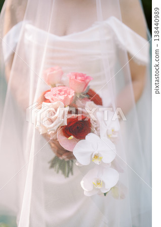 An Elegant Cascade Of Pastel Roses And Fragrant Orchids 138440989
