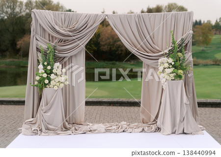 Elegant Floral Archway Enhances Romantic Garden Ambiance Elegant Floral Archway Enhances Romantic Garden Ambiance 138440994