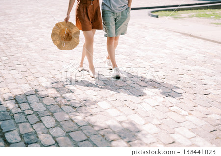 Serene Couple Enjoying Sunny Day By Exploring Urban Pathways Serene Couple Enjoying Sunny Day By Exploring Urban Pathways 138441023