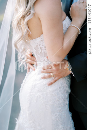 Intimate Wedding Scene With Delicate Lace And Loving Touches Intimate Wedding Scene With Delicate Lace And Loving Touches 138441047