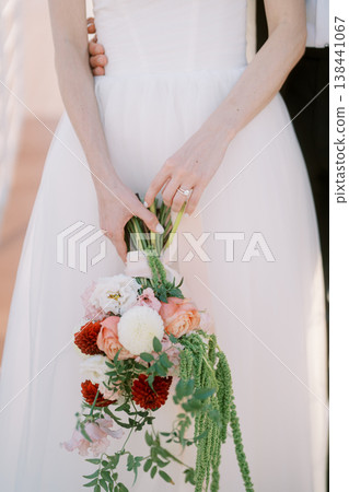 Bridal Attire Complemented By Lush Floral And Greenery Details Bridal Attire Complemented By Lush Floral And Greenery Details 138441067