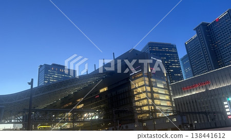 The cityscape of Umeda at dusk: Osaka Station City and the cluster of skyscrapers. The cityscape of Umeda at dusk: Osaka Station City and the cluster of skyscrapers. 138441612
