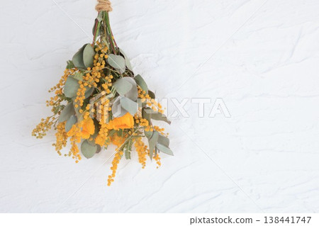 Mimosa and ranunculus swag 138441747