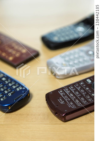 Lots of cell phones 138442185