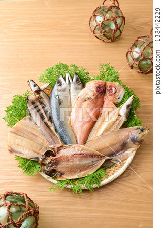 Various kinds of dried fish arranged on a sieve Various kinds of dried fish arranged on a sieve 138442229