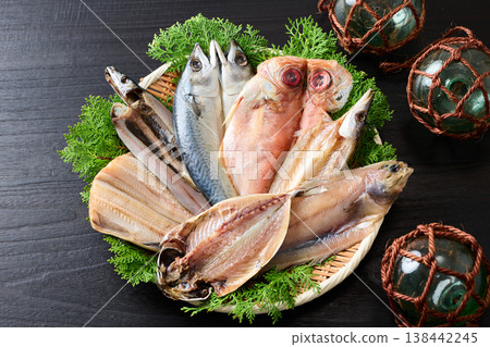 Various kinds of dried fish arranged on a sieve Various kinds of dried fish arranged on a sieve 138442245