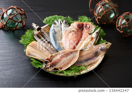 Various kinds of dried fish arranged on a sieve Various kinds of dried fish arranged on a sieve 138442247