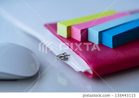 Notebook and sticky notes on a table Notebook and sticky notes on a table 138443115