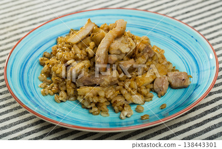 Barley porridge with pork roast is tasty tradition of Christmas Barley porridge with pork roast is tasty tradition of Christmas 138443301