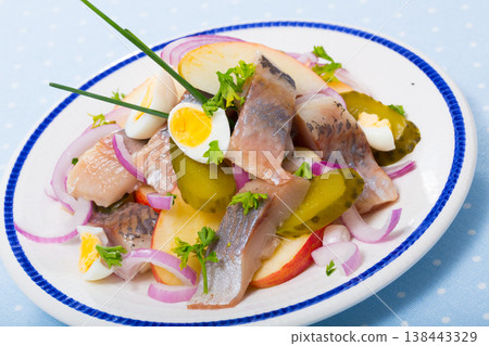 Herring salad with apples and cucumbers Herring salad with apples and cucumbers 138443329