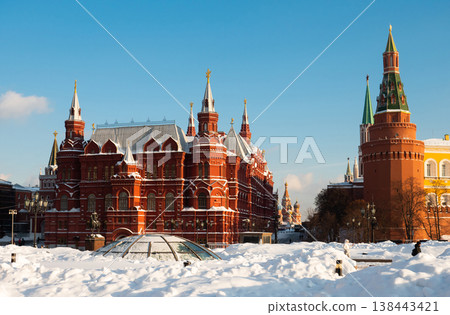 Snowy Manezhnaya Square in Moscow with Historical Museum and Kremlin towers 138443421