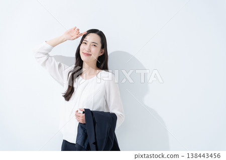 A businesswoman in the sun A businesswoman in the sun 138443456