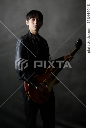 Young male musician live performance 138444048