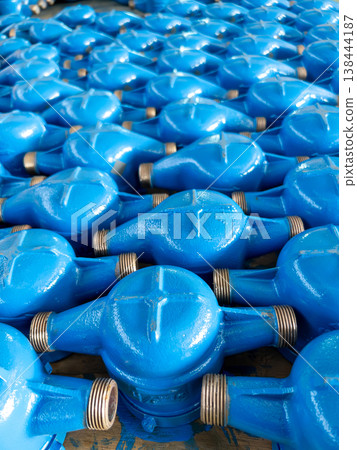 Industrial Blue Water Meter Casings in Production Line Industrial Blue Water Meter Casings in Production Line 138444187