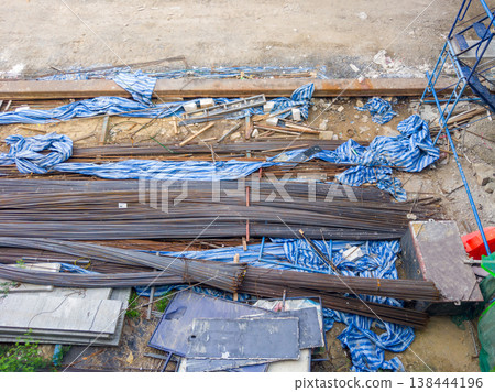 Steel Rebars Stacked at Construction Site for Building Reinforcement. Steel Rebars Stacked at Construction Site for Building Reinforcement. 138444196