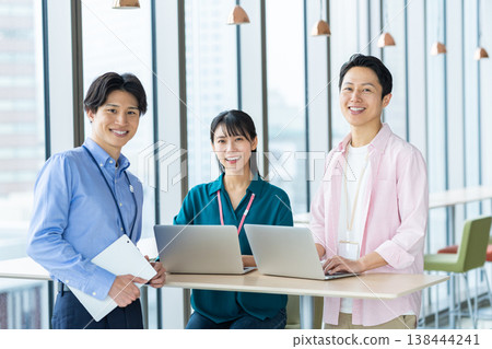 Engineers working in an office. Photo courtesy of Denpa Gakuen, Tokyo Electronics College. 138444241