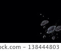 A pointillist illustration of round jellyfish and bubbles floating in the deep sea (on a jet-black background). 138444803