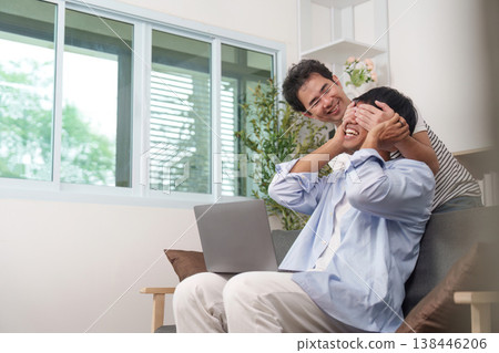 LGBTQ couple sharing a joyful moment at home LGBTQ couple sharing a joyful moment at home 138446206