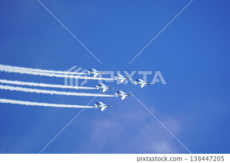 Blue Impulse flying in the blue sky Blue Impulse flying in the blue sky 138447205