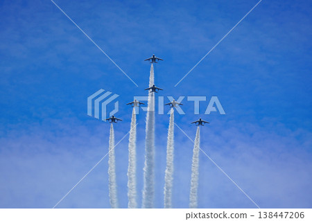 Blue Impulse leaves contrails in the sky. Blue Impulse leaves contrails in the sky. 138447206