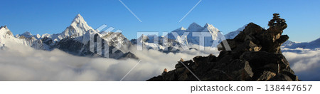 Cairns on Kala Patthar, sea of fog and Mount Ama Dablam, Nepal. Cairns on Kala Patthar, sea of fog and Mount Ama Dablam, Nepal. 138447657