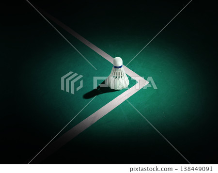 A badminton shuttlecock is placed upright on the badminton court The background is black. A badminton shuttlecock is placed upright on the badminton court The background is black. 138449091