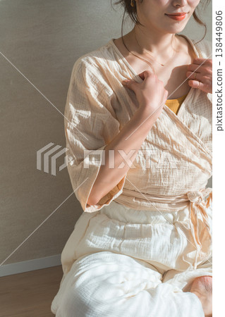 A woman by the window in the setting sun (model, fashion, light, shadow) A woman by the window in the setting sun (model, fashion, light, shadow) 138449806