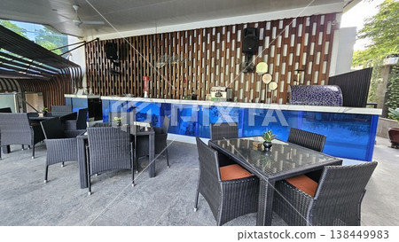 tables and chairs in restaurant 138449983