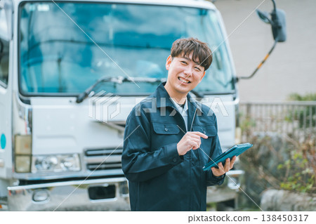 Truck driver and tablet 138450317
