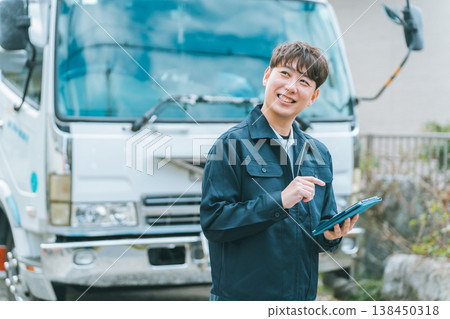 Truck driver and tablet 138450318