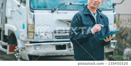 Truck driver and tablet 138450320