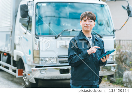 Truck driver and tablet 138450324