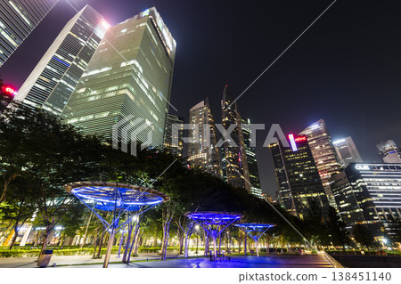 Night view of the Marina Bay Financial Centre and the Raffles Place modern office skyscrapers along Marina Bay in Singapore.  138451140