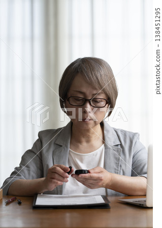 Senior woman hesitant to sign and seal contract - negative 138451295