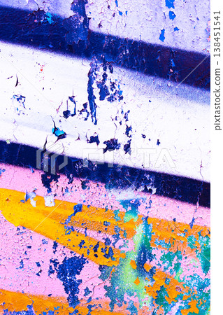 Graffiti Peeling Paint Texture on Urban Wall with Pink and Blue Spray Paint 138451541